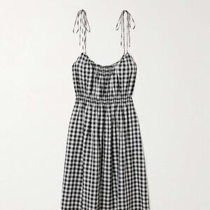 Does  Leslie dress black and white check - x-small, new with tags